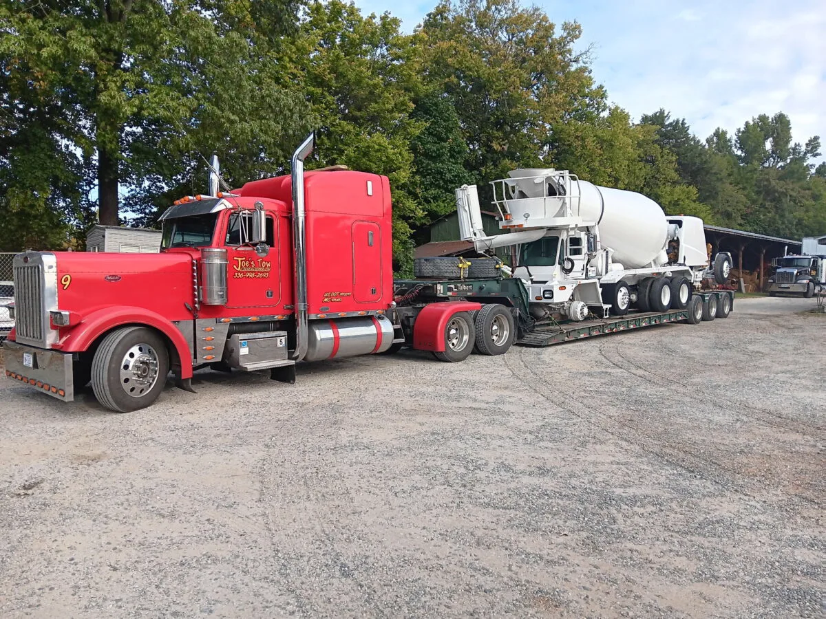Joe’s Tow hauling heavy equipment in Mocksville, North Carolina