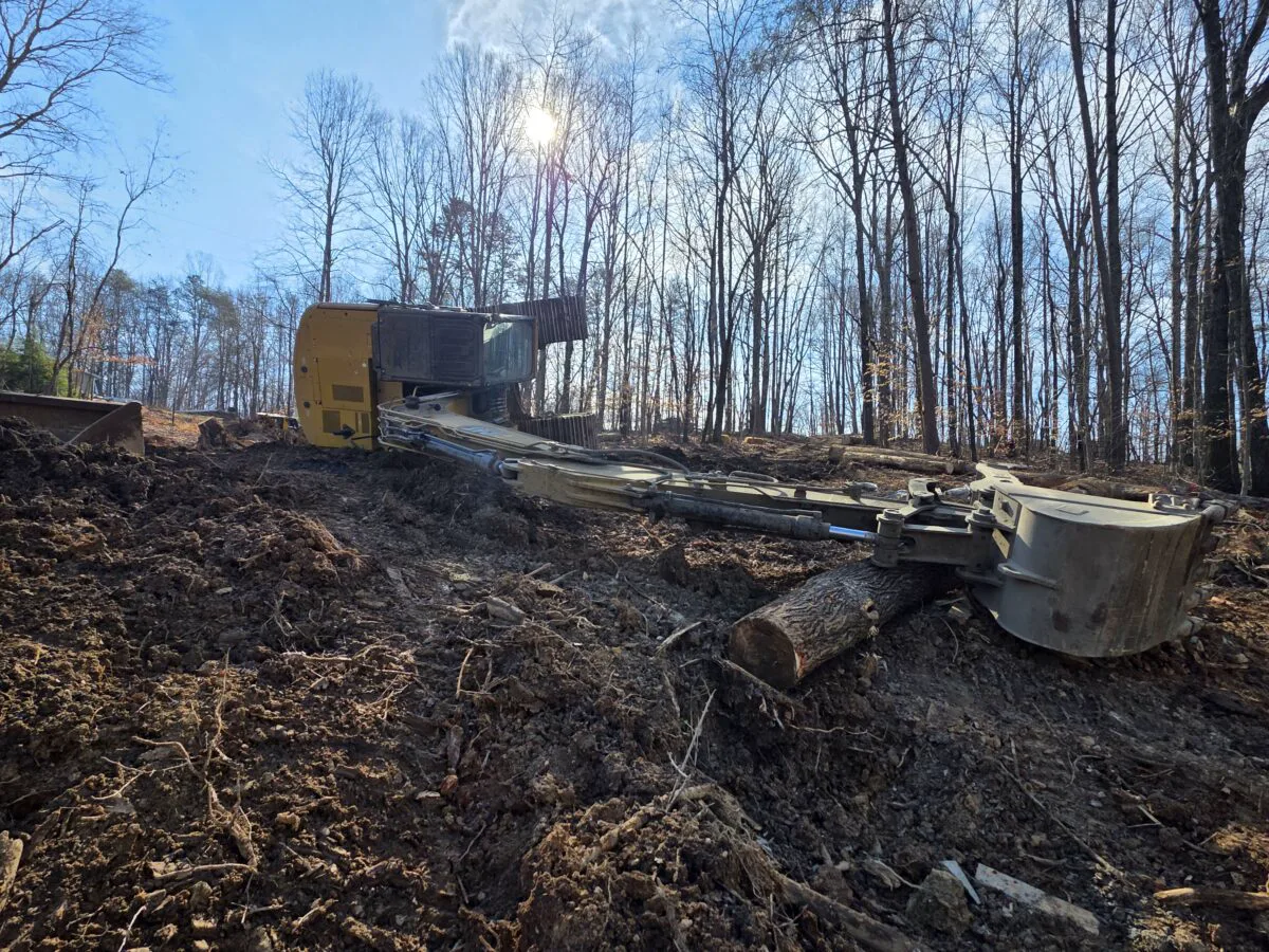Heavy machinery recovery in wooded terrain